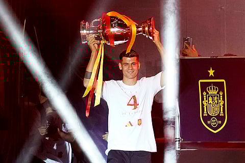 Spain's team captain Alvaro Morata with trophy